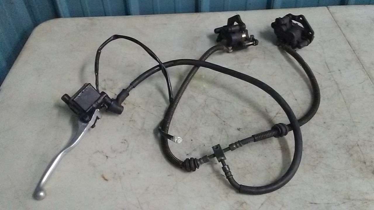 2002 - 2003 Kawasaki PRAIRIE 650 Brake Caliper Assembly